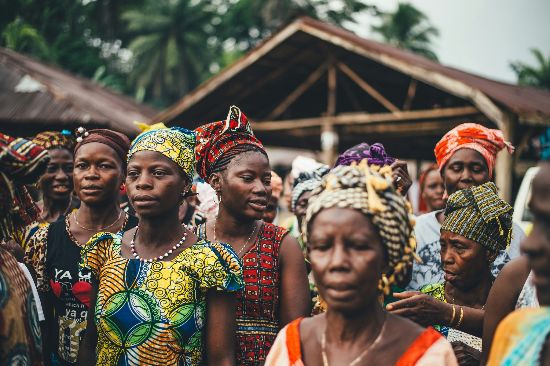 Women gathered together at a community meeting
