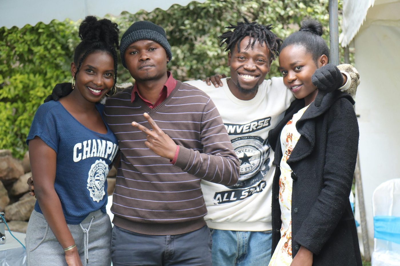 Four young people together outdoors